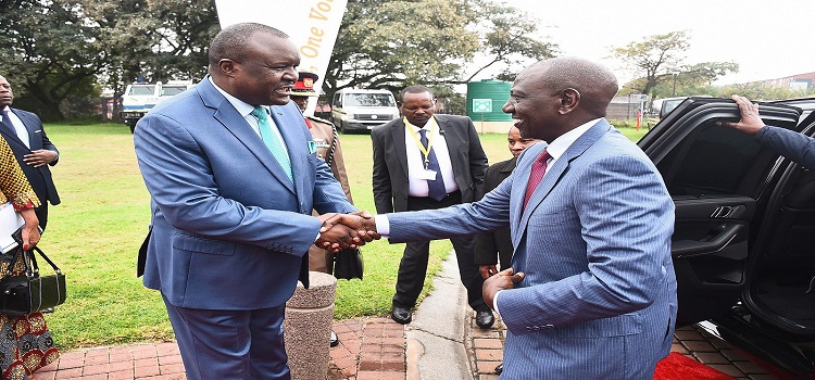 The Pan African Parliament President, Chief Fortune Charumbira (L) receiving President Ruto at the continental parliament